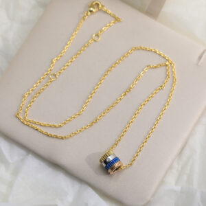 QUATRE 4 ROW PEDANT BLUE GOLD NECKLACE