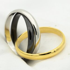 TRINITY RING BLACK GOLD SILVER